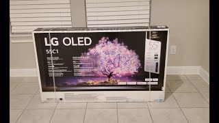 LG OLED C1 Unboxing Assemble Setup and First Impressions [upl. by Thomasina]